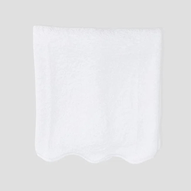 White pocket square on a light gray background