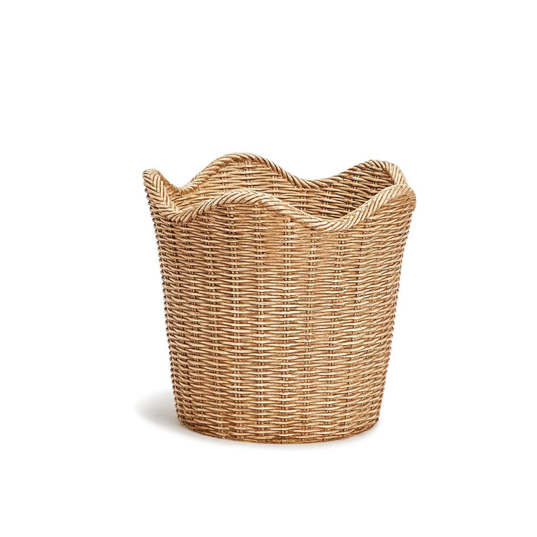 Woven basket with a wavy top on a white background