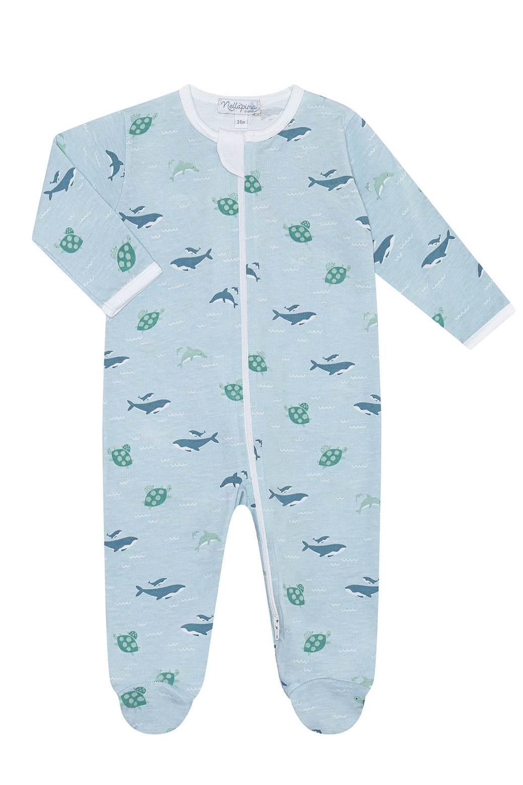 Baby onesie with whale pattern on a light blue background