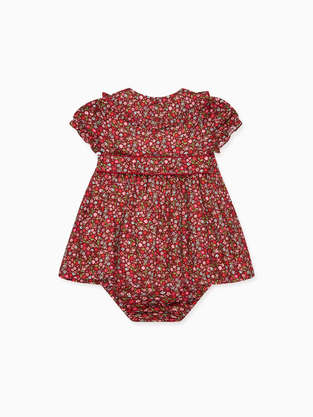 A baby girl dress in a red and green floral print, featuring short ruffled sleeves and a gathered waist, laid flat against a white background.