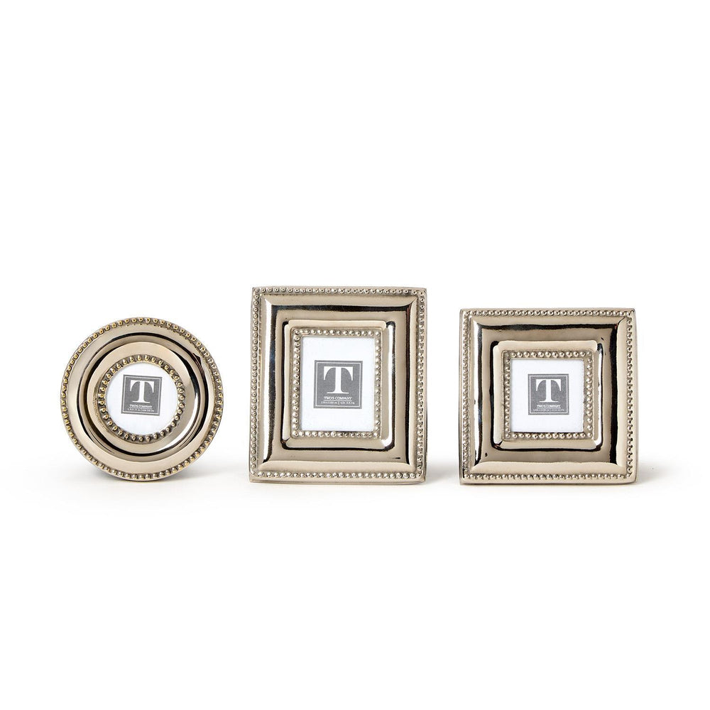 Three decorative picture frames of different sizes on a white background