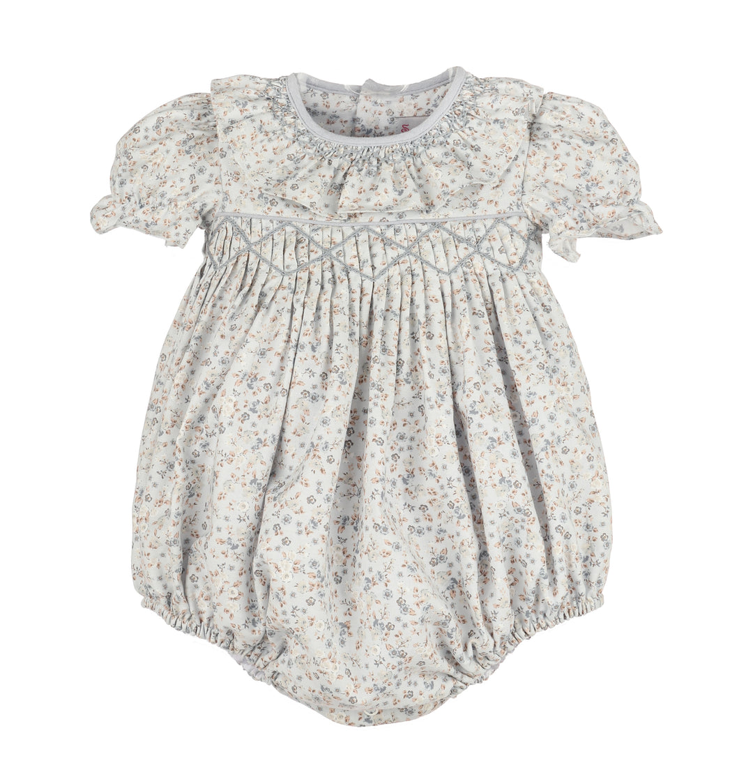 Baby romper with floral pattern on a white background