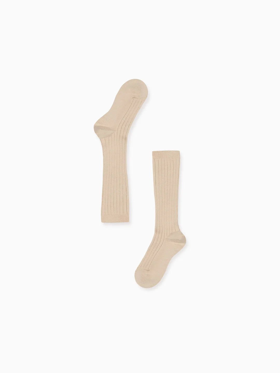 A pair of ribbed knee-high socks in a light beige color, displayed flat against a solid white background.