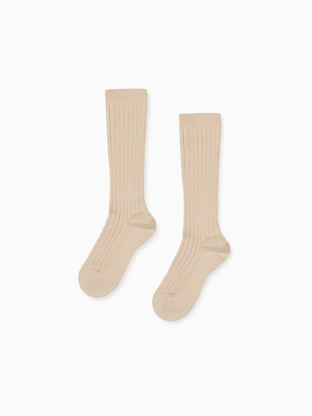 Pair of beige knee-high socks on a white background