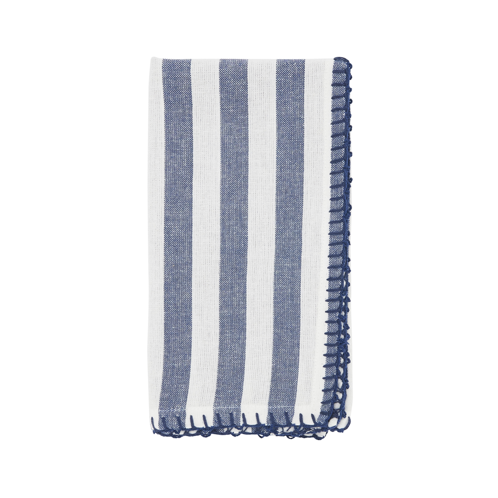 Striped blue and white towel with frayed edges on a white background