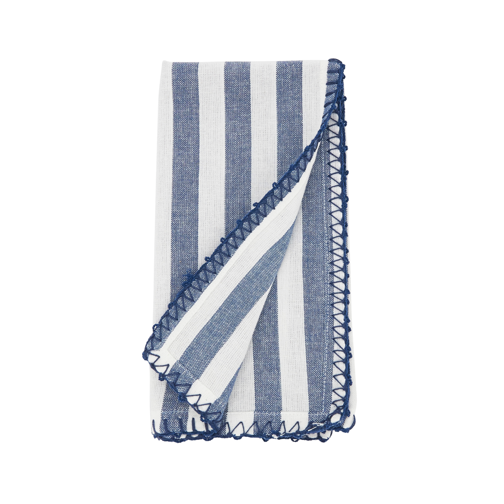 Blue and white striped dinner napkin with ruffled edge on a white background