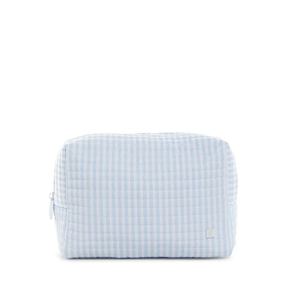Blue and white checkered toiletry bag on a white background