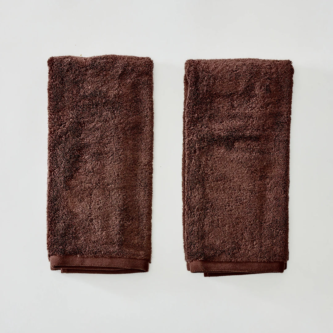 pair of brown hand towels
