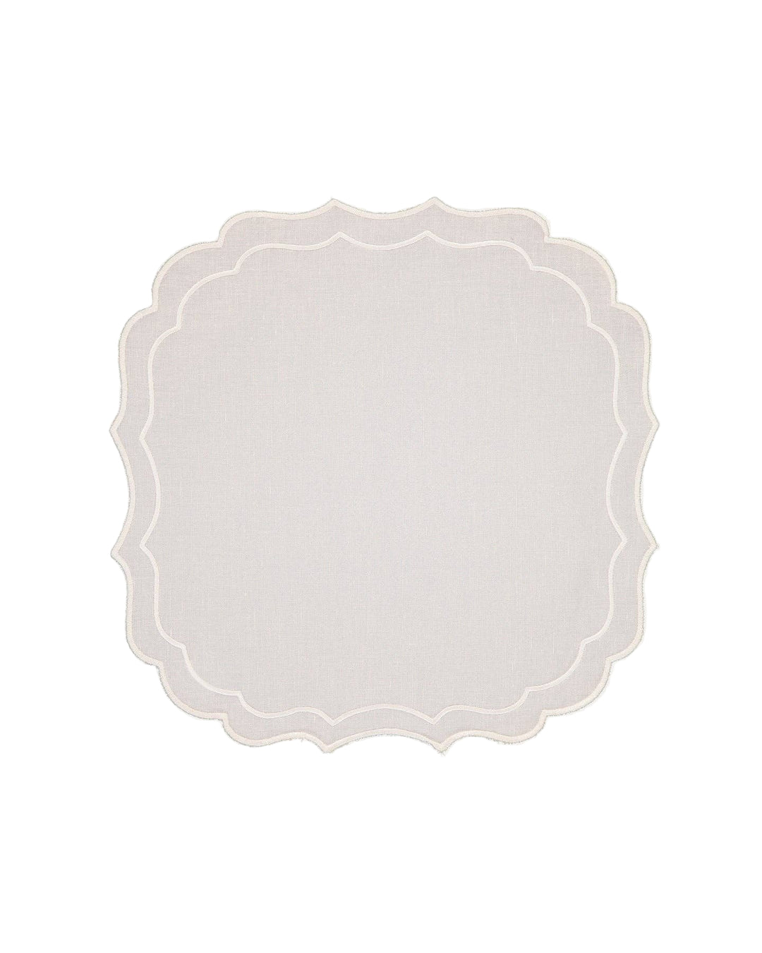 white linen placemat with scalloped border