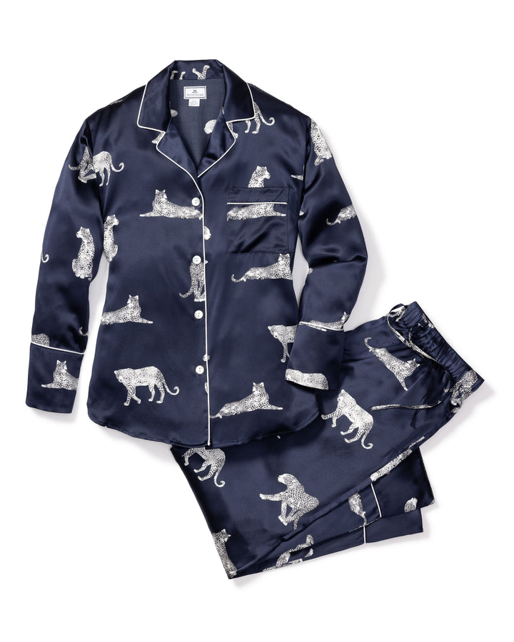 Navy blue pajama set with animal pattern on a white background