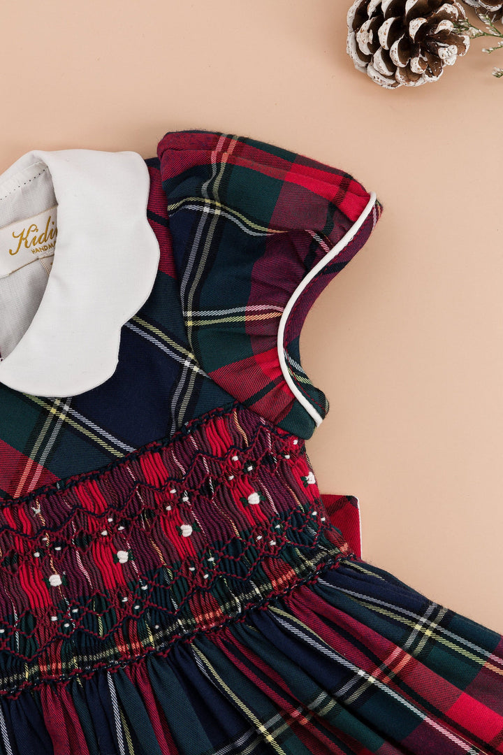 Ritha smocked dress in navy and red tartan